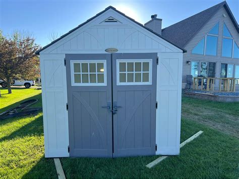 Like new from Lowes 8x10 Suncast Tremont Gable Resin Storage Shed with