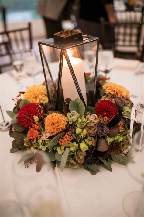 Fall Reception Centerpiece With Red Orange And Yellow Flowers