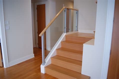 We finally stained our stair rails and banisters!! Interior Railing Designs • Avilion Metalcraft