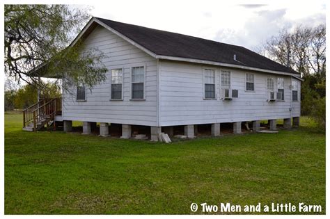 Foundation was the classic rustic a closed crawlspace for owners. Two Men and a Little Farm: BACK OF HOUSE