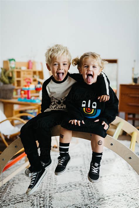 Cool Brother And Sister In Their Playroom Del Colaborador De Stocksy Melissa Milis