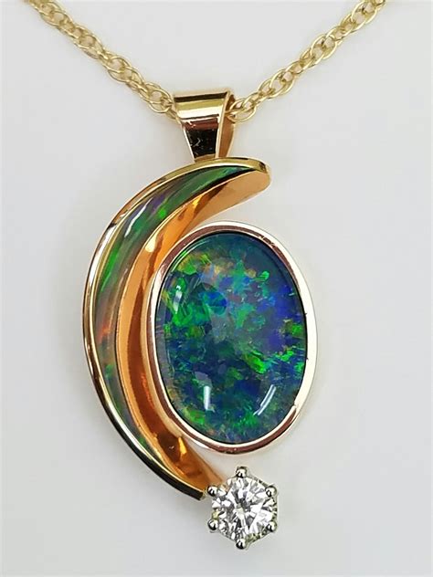 14k Pendant Set With A Black Opal And Diamond Jewelry Expressions Inc