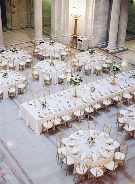 Mixed round and rectangle gold and white wedding reception table layout