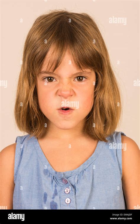 Angry Little Girl Looking At Camera Stock Photo 81368603 Alamy