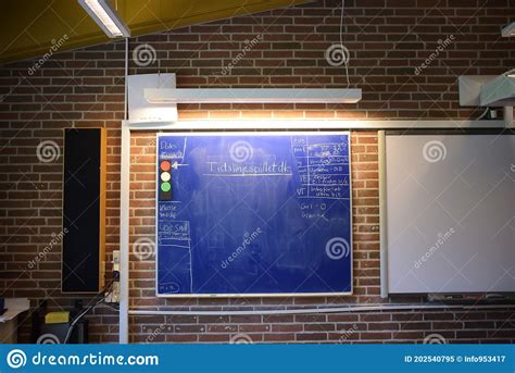 Writing On A Chalkboard In A Classroom Stock Image Image Of Planing