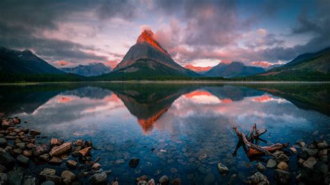 1366x768 Surreal Sunrise At The Swiftcurrent Lake 5k Laptop Hd Hd 4k