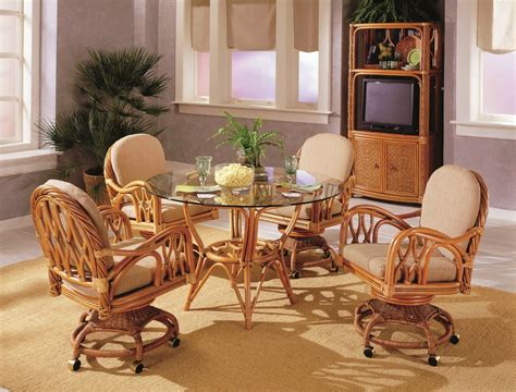 Vintage tropical bent rattan dining chairs, set of 6 offered for sale is a set of four bent rattan dining chairs with loose seat cushions. South Sea Rattan New Twist 5 Piece Indoor Dining Set ...