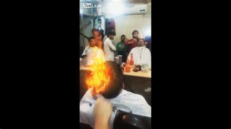 incredible barber uses fire to cut hair in pakistan youtube