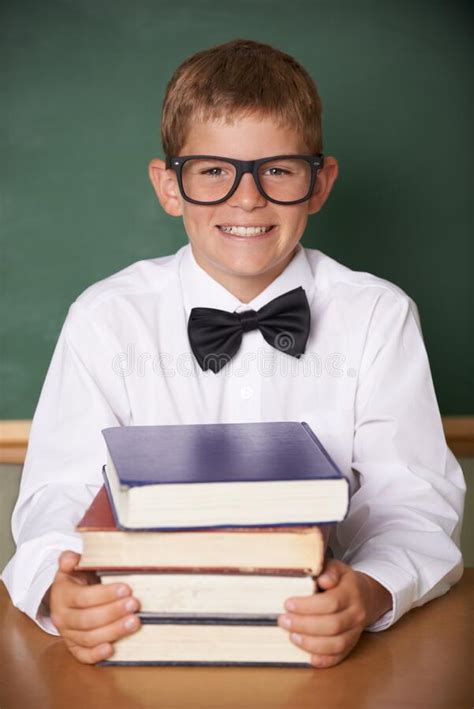 Hes Prepared For The Exam A Happy Young Schoolboy Wearing Glasses And