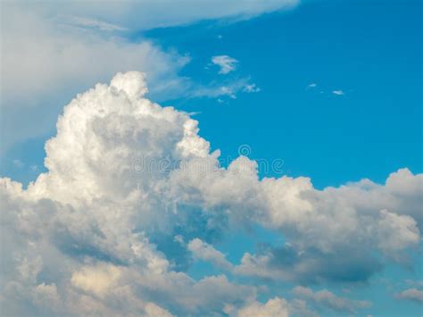 Beautiful Billowing White Cloud Formation And Clear Blue Sky Stock