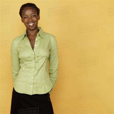 Studio Shot Of African Woman Smiling Stock Photo Dissolve