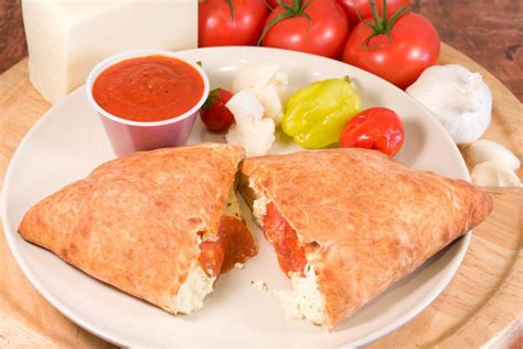 Home of the original hot cheetos pizza. Calzones - Ameci Pizza Kitchen