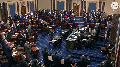 trump impeachment trial continues with senators swearing in