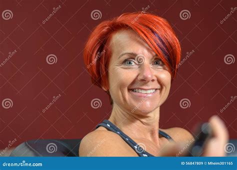 Happy Middle Aged Redhead Woman Smiles At Camera Stock Image Image Of Pleased Attractive