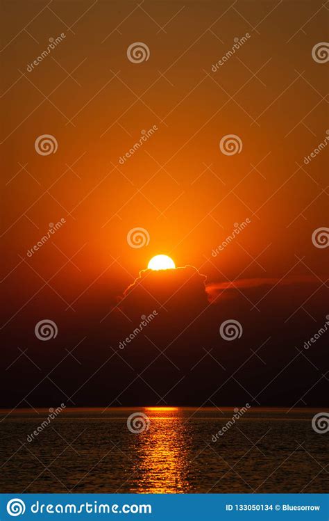 Dramatic Red Orange Colored Sunset Over The Calm Sea At Summer Stock Photo - Image of over ...