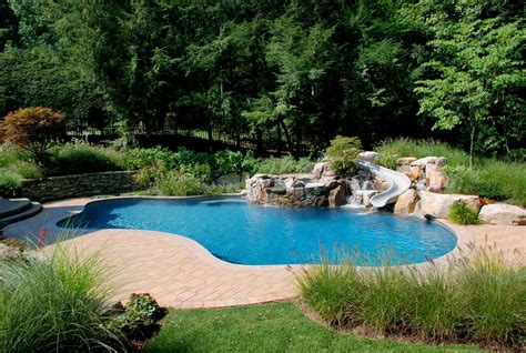 Freeform Pool With Natural Spa Waterfall And Slide Residential Pool