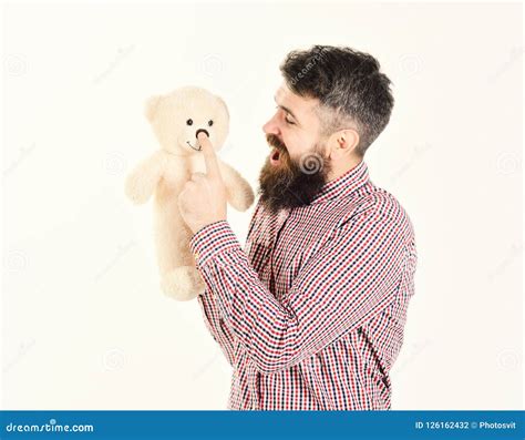 Lovely Portrait Of A Young Man Holding A Teddy Bear Stock Photo