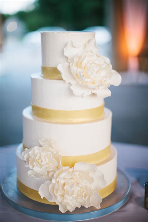 Get wedding flowers ideas and wedding inspiration from our wedding flower experts! White Fondant Wedding Cake with Peony Sugar Flowers