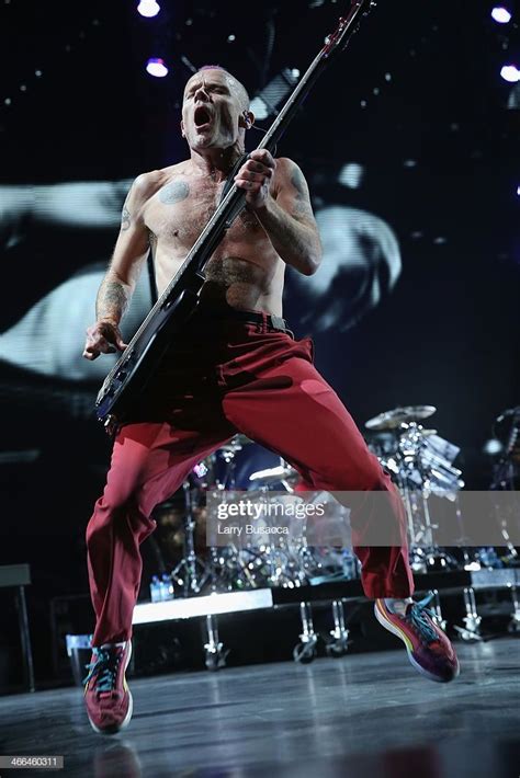 Bassist Michael Flea Balzary Of Red Hot Chili Peppers Performs