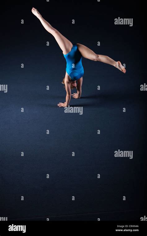 Gymnast Doing Handstand With Legs Split Stock Photo Alamy