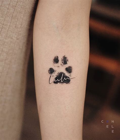 details 51 meaningful paw print tattoo best in cdgdbentre