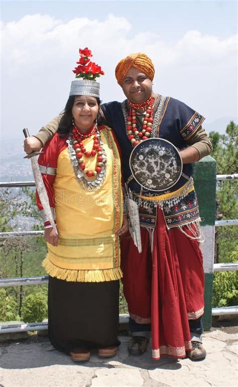 two people standing next to each other in costume