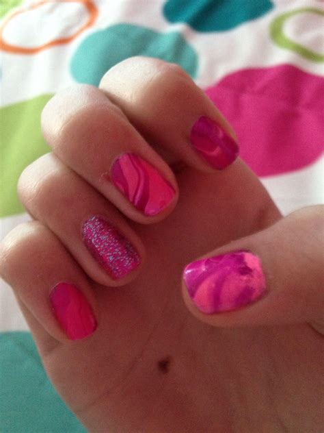 Warm water minimizes color fading and wrinkling. Swirly nails!!! All u do is paint your nails. Then get a ...