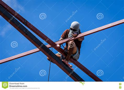 Construction Workers Working On High Stock Photo Image Of Place