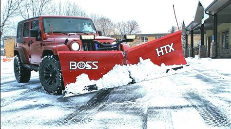 Snow Removal Of Parking Lot With Jeep Wrangler And Boss Htx V Plow Youtube
