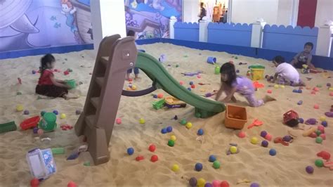 Kids Playing Sand On The Indoor Playground Play Slide On