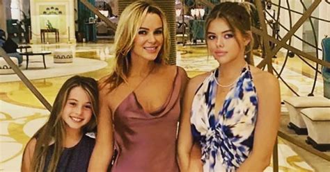 Amanda Holden Stuns In A Satin Minidress As She Poses With Her Two Lookalike Daughters Mirror