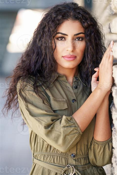 Young Arab Woman With Curly Hair Outdoors 5888126 Stock Photo At Vecteezy