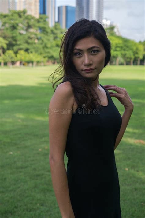 Young Beautiful Asian Woman At The Park Outdoors Stock Image Image Of