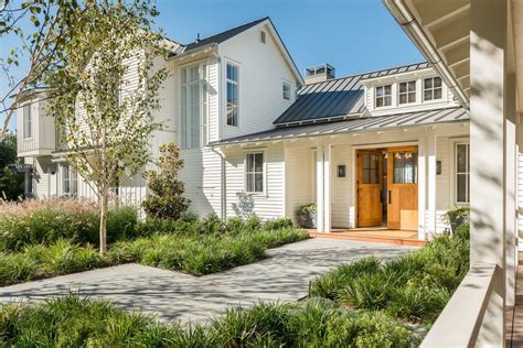 Rustic and modern design elements complement one another in this 2,480 sq. Image result for modern farmhouse landscaping ideas ...