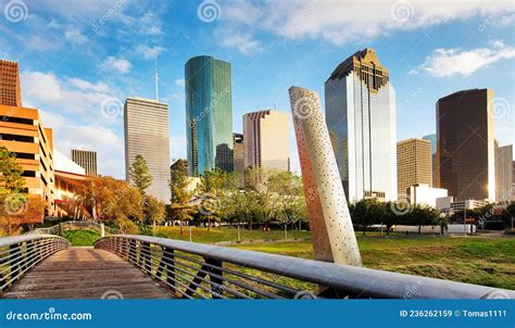 Ooden Bridge In Buffalo Bayou Park With A Beautiful View Of Downtown