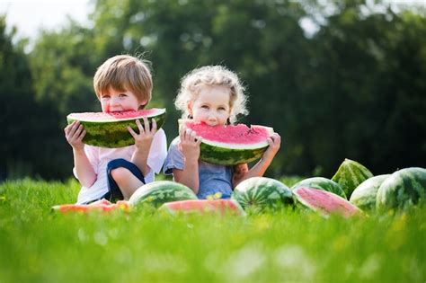 Premium Photo Funny Kids Eating Watermelon Outdoor