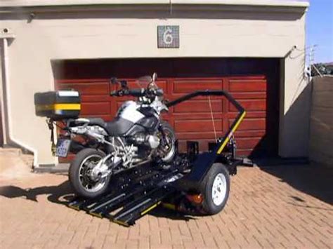 The trailer is made in canada, by national rv siding. Easy loader double trailer - How to load a motorcycle ...