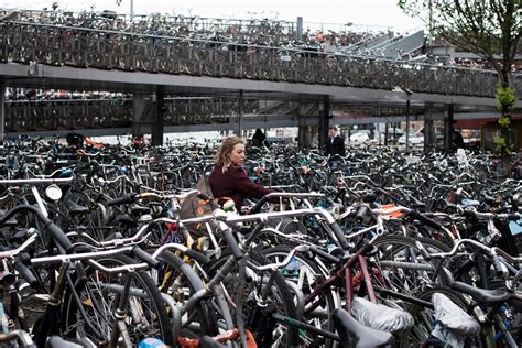 the dutch prize their pedal power but a sea of bikes swamps their capital the new york times