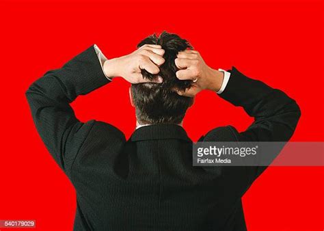 Business Man Pulling Hair Out Photos And Premium High Res Pictures