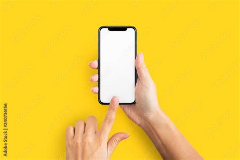 Mockup Of Female Hand Holding Cell Phone With Blank Screen Stock Photo