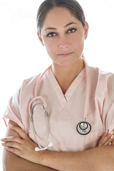 Portrait Of Female Doctor Standing Arms Crossed With Stethoscope Around Neck Stockfreedom