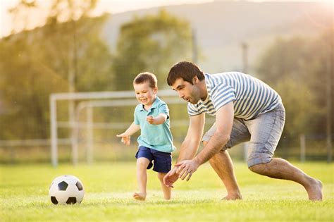 Father And Son Playing Football By Jozef Polc Photo 110279283 500px