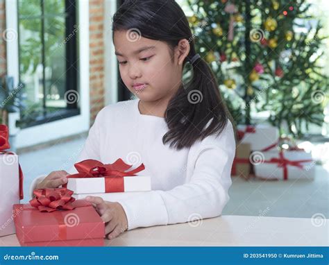 Little Girl With Christmas T Boxes Stock Photo Image Of Ribbon