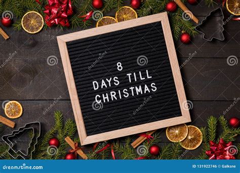Eight Days Till Christmas Countdown Letter Board On Dark Rustic Wood