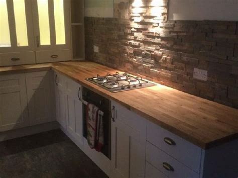 Slate mosaic tile adds unique detail to any bathroom or kitchen. Slate wall tiles with an Ivory kitchen and oak worktop ...