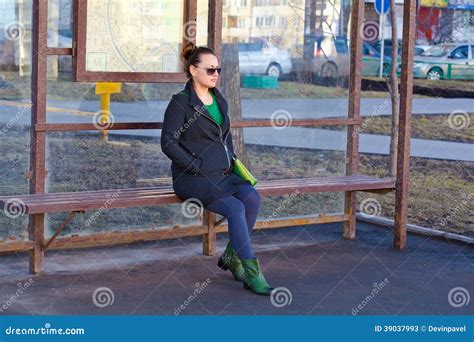 Girl Waiting For Transport At The Bus Stop Stock Image Image Of Stand City 39037993