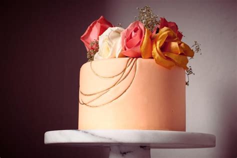 Peach Wedding Cake With Gold Detail And Roses Beautiful Springsummer