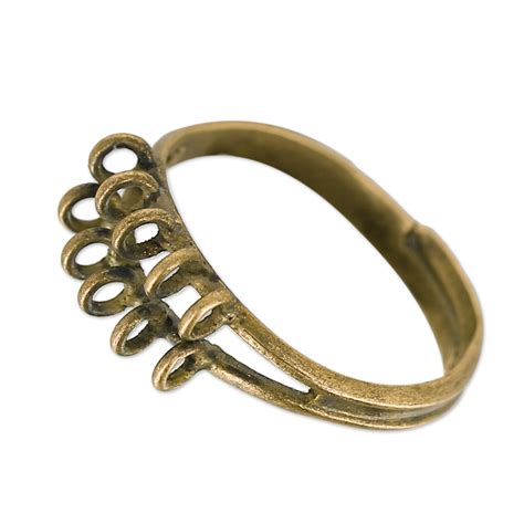 In puncto komfort unter anderem. Ring mit 10 Ösen Bronze Farbe - Perles & Co