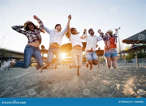 Happy Group Of Young People Having Fun At Beach Stock Image Image Of