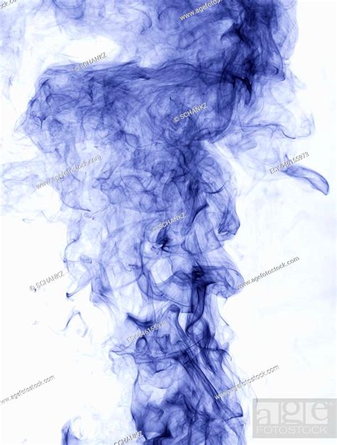 Blue Smoke On A White Background Inversion Stock Photo Picture And
